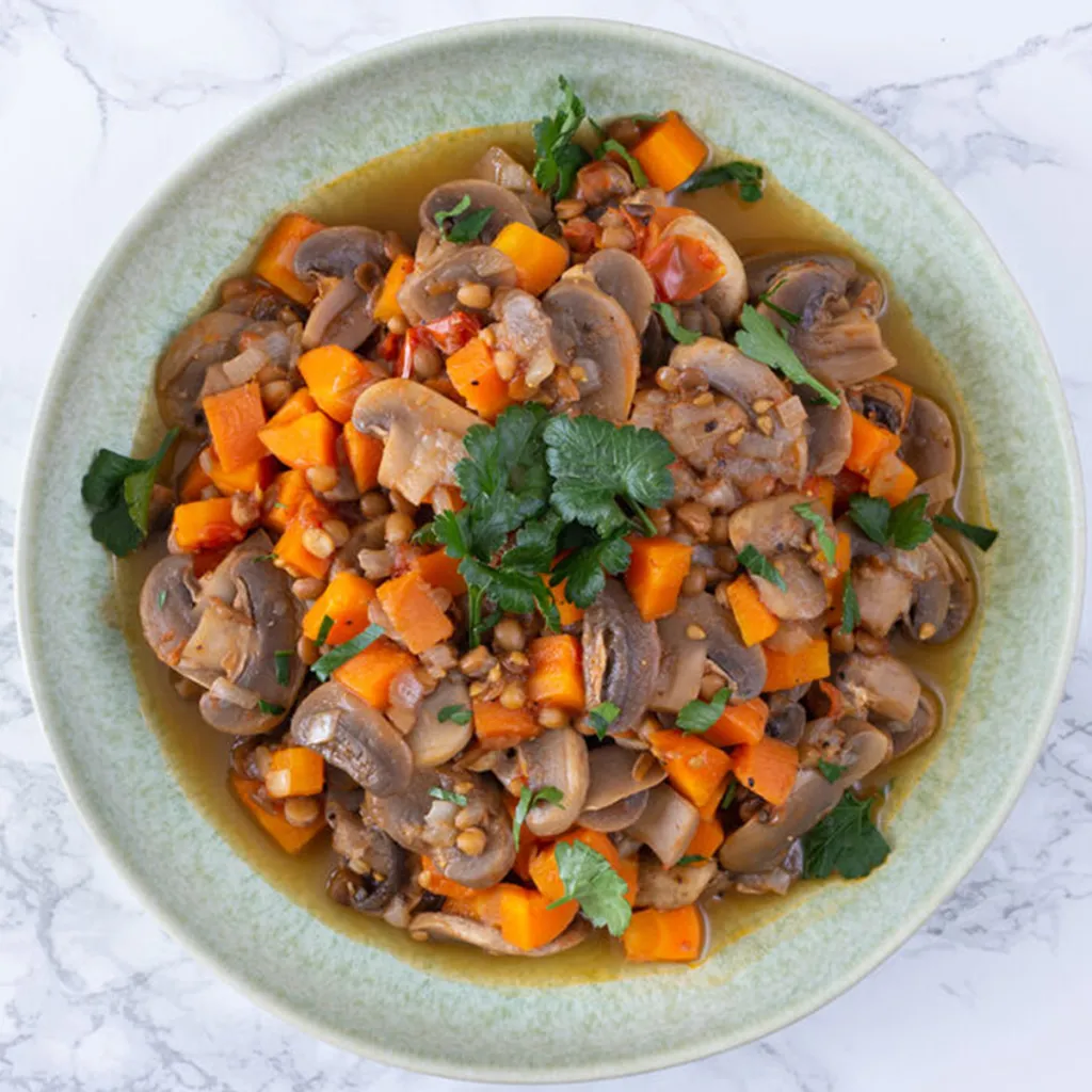 Foto: groentestoof met wortel, champignons