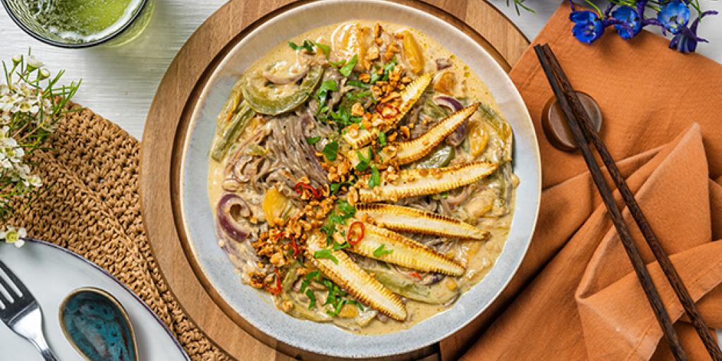 Thaise curry met babymais en chili-cashews