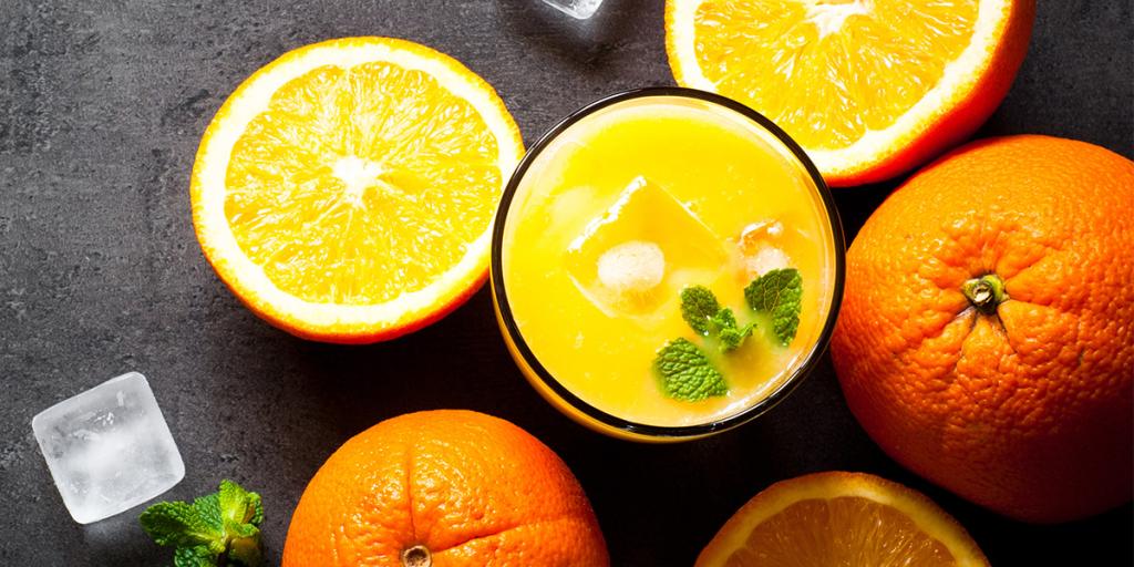 Foto sinaasappels en sinaasappelsap of te wel vruchtensuikers