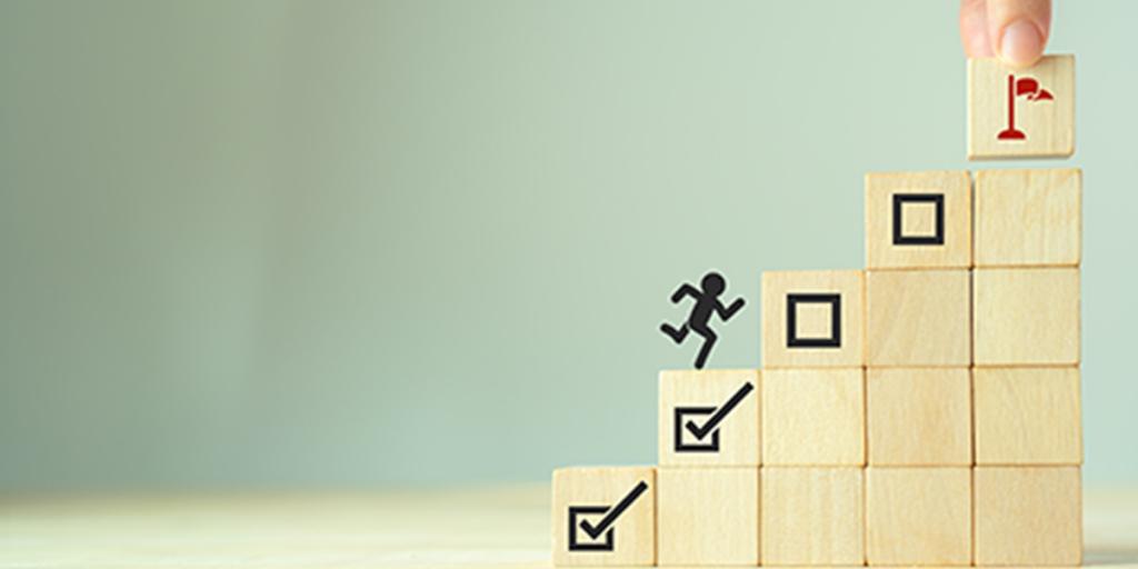 blokjes worden gestapeld bovenste met afbeelding doelvlag