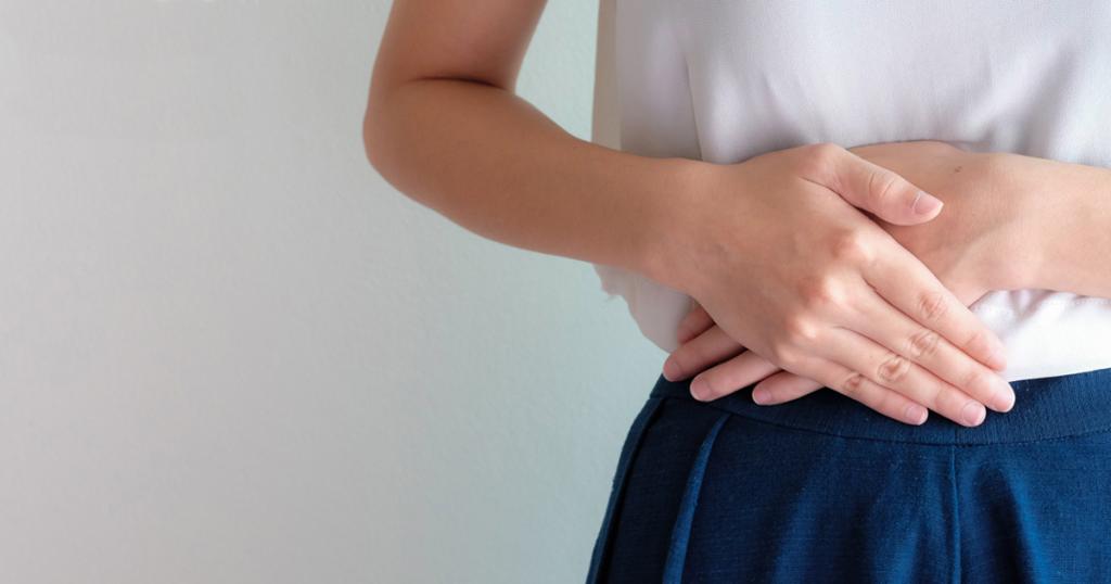 Vrouw heeft last van darmen door te veel suiker
